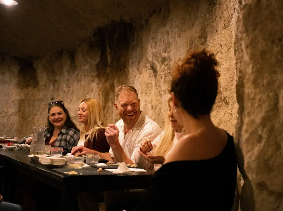 Group of friends enjoying a cheese tasting session